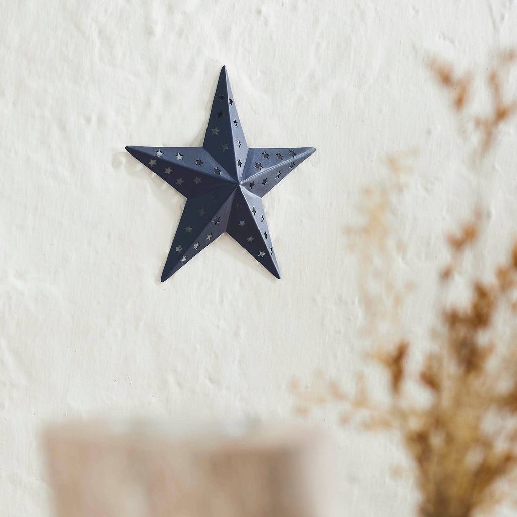 Navy punched metal star, 6 by 6 inches