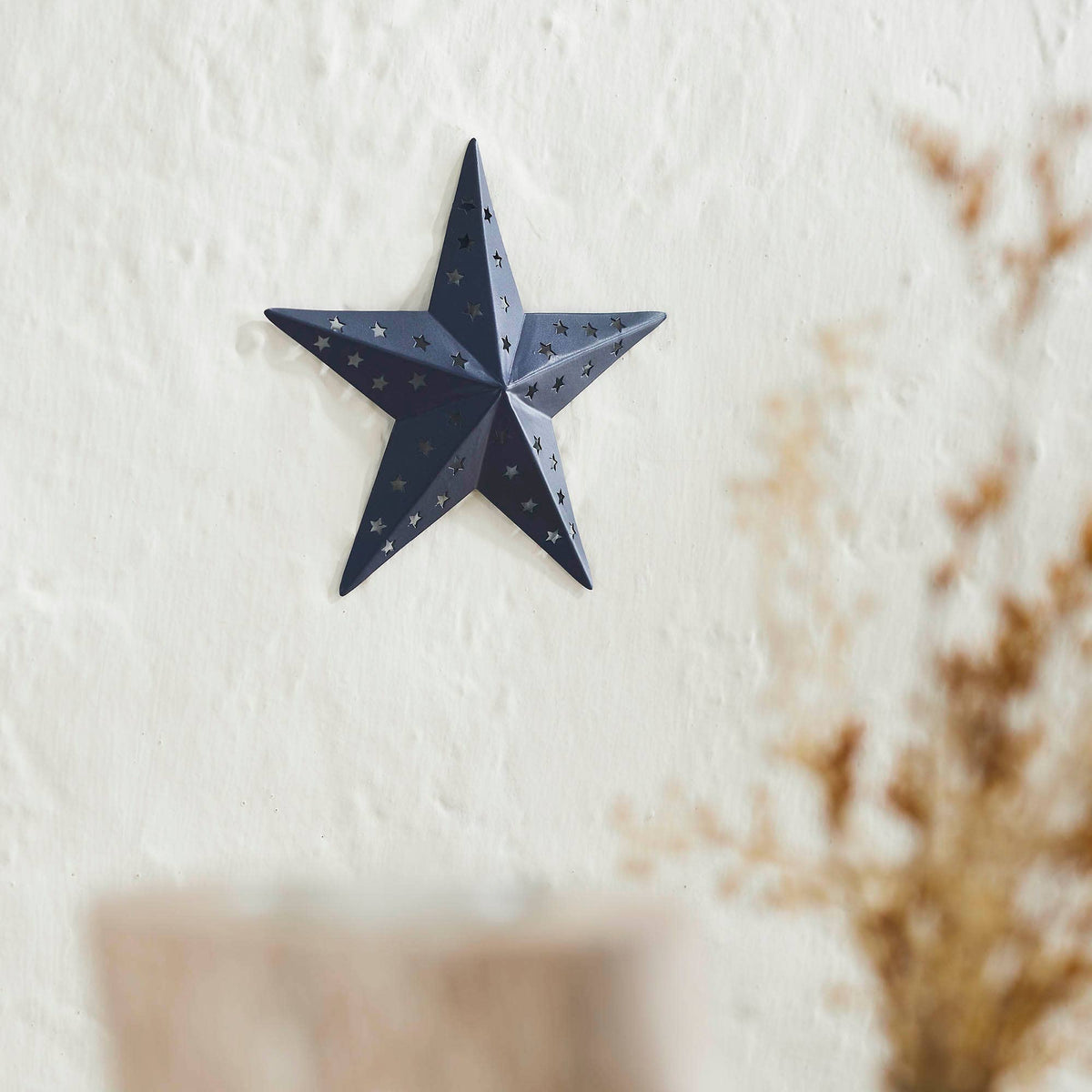 Navy punched metal star, 6 by 6 inches