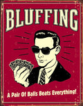 Bluffing tin sign with playing-card artwork and A Pair of Balls Beats Everything slogan