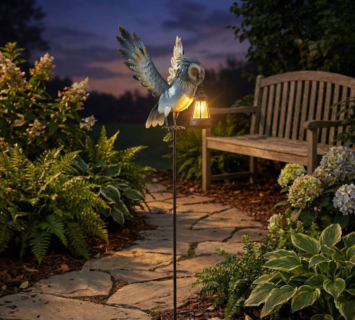 Metal Owl Garden Stake Holding a Solar Lighted Lantern