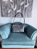 Blue and black skull purse